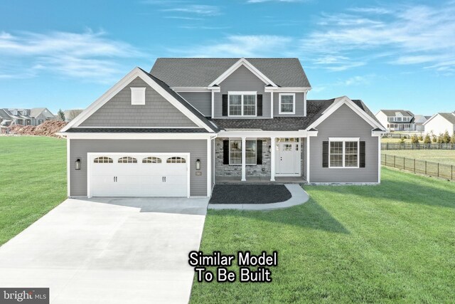 3227 Oxford Rd, New Oxford, PA 17350 - traditional home featuring driveway, covered porch, an attached garage, and a shingled roof