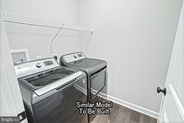 3227 Oxford Rd, New Oxford, PA 17350 - laundry room featuring independent washer and dryer, wood finished floors, and baseboards