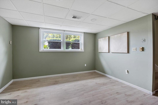 17 Bermuda Ave, Bridgeton, NJ 08302 - empty room with wood finished floors, a drop ceiling, and baseboards