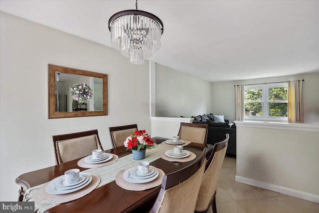 17 Bermuda Ave, Bridgeton, NJ 08302 - dining space featuring light tile patterned flooring, a chandelier, and baseboards