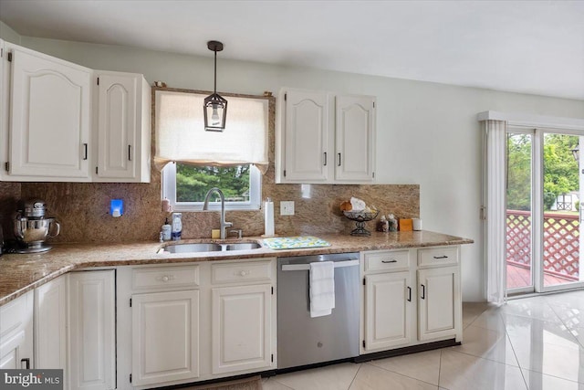 17 Bermuda Ave, Bridgeton, NJ 08302 - kitchen featuring stainless steel dishwasher, a sink, white cabinetry, and tasteful backsplash