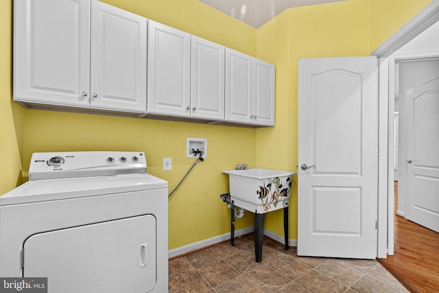 1903 Scottish Isle Ct, Abingdon, MD 21009 - laundry area featuring washer / clothes dryer, cabinet space, and baseboards