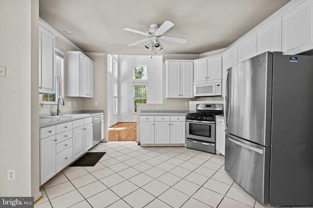 1903 Scottish Isle Ct, Abingdon, MD 21009 - kitchen with appliances with stainless steel finishes, light countertops, white cabinetry, and ceiling fan