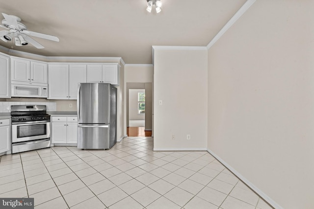 1903 Scottish Isle Ct, Abingdon, MD 21009 - kitchen with appliances with stainless steel finishes, a ceiling fan, crown molding, baseboards, and white cabinetry