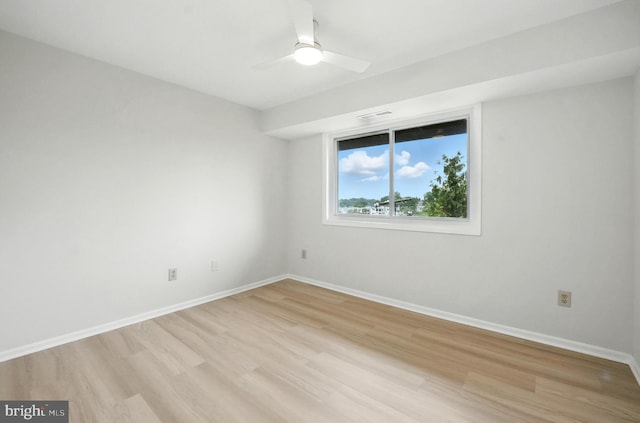 218 Locust St SE Unit 151, Vienna, VA 22180 - empty room featuring light wood-style flooring and a ceiling fan