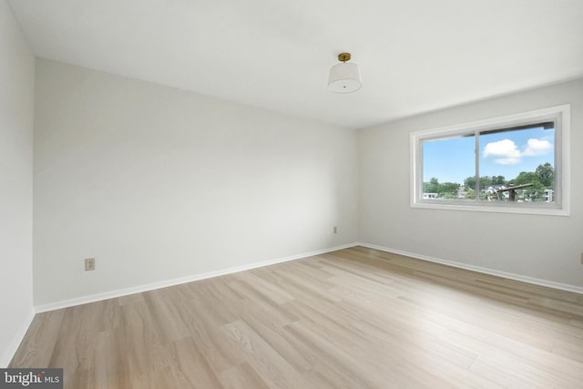 218 Locust St SE Unit 151, Vienna, VA 22180 - unfurnished room with light wood-type flooring and baseboards