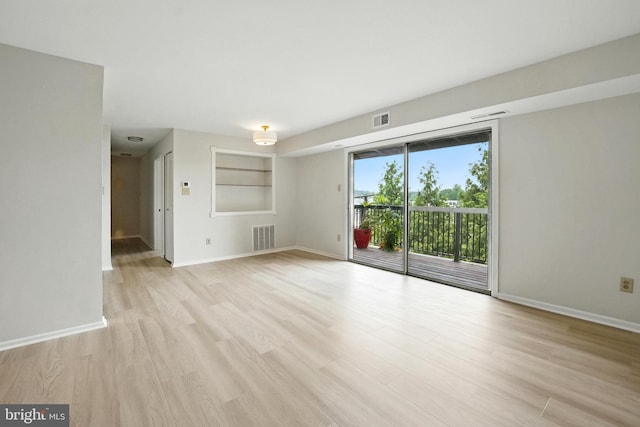 218 Locust St SE Unit 151, Vienna, VA 22180 - unfurnished room with light wood finished floors and baseboards