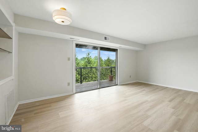 218 Locust St SE Unit 151, Vienna, VA 22180 - spare room featuring light wood-type flooring