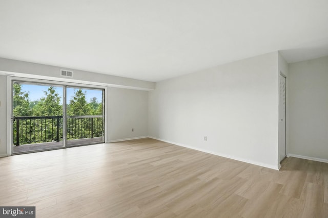 218 Locust St SE Unit 151, Vienna, VA 22180 - spare room with light wood-style flooring and baseboards