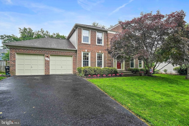 408 Maravista Ct, Silver Spring, MD 20905 - view of front of home featuring a garage, a front yard, brick siding, and driveway