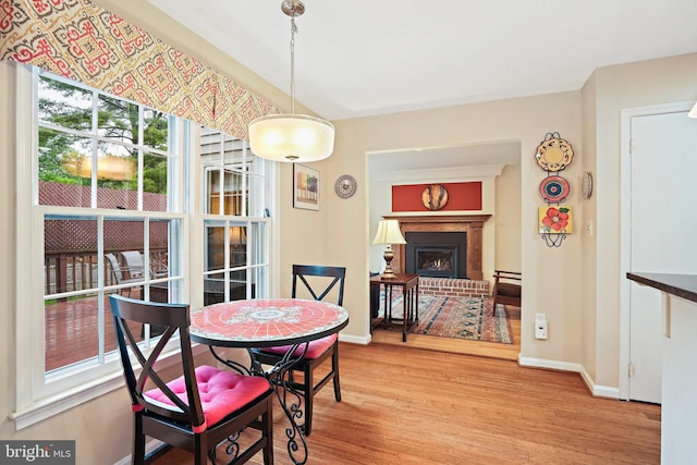 408 Maravista Ct, Silver Spring, MD 20905 - dining area featuring wood finished floors, baseboards, and a fireplace