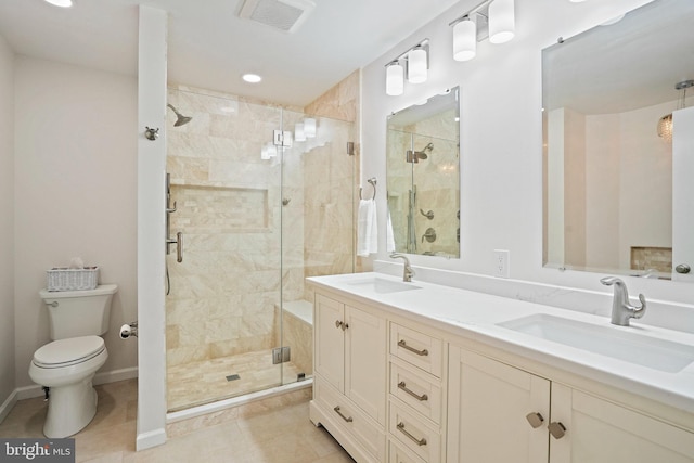 408 Maravista Ct, Silver Spring, MD 20905 - full bathroom with a shower stall, toilet, double vanity, tile patterned flooring, and recessed lighting