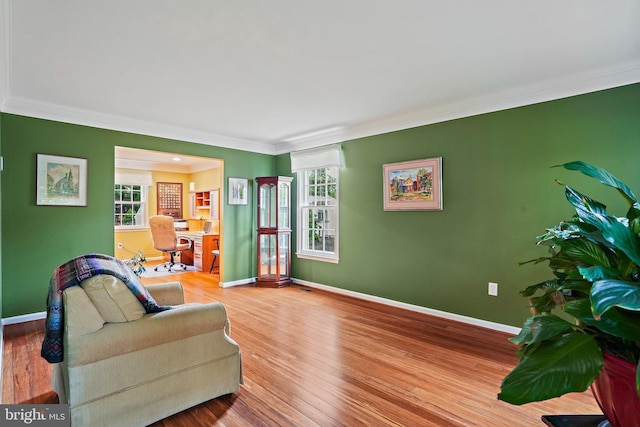 408 Maravista Ct, Silver Spring, MD 20905 - living room featuring ornamental molding, baseboards, wood finished floors, and a desk