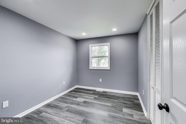 2500 Gehb Ave, Baltimore, MD 21227 - unfurnished bedroom with a closet, wood finished floors, baseboards, and recessed lighting