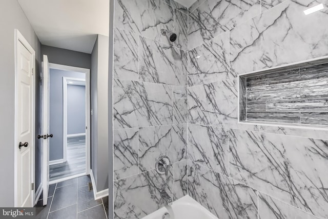 2500 Gehb Ave, Baltimore, MD 21227 - full bathroom with washtub / shower combination and baseboards