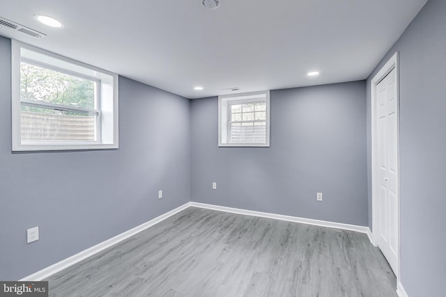 2500 Gehb Ave, Baltimore, MD 21227 - below grade area featuring wood finished floors, baseboards, and recessed lighting