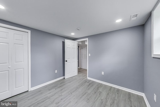 2500 Gehb Ave, Baltimore, MD 21227 - unfurnished bedroom featuring wood finished floors, baseboards, recessed lighting, and a closet