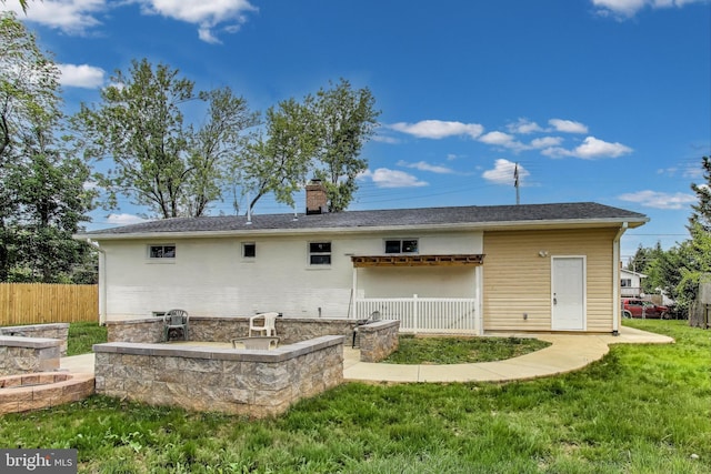 2500 Gehb Ave, Baltimore, MD 21227 - rear view of property with a chimney