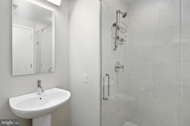 2101 Market St Unit 902, Philadelphia, PA 19103 - bathroom with a stall shower and a sink