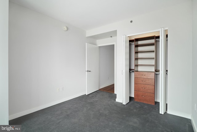 2101 Market St Unit 902, Philadelphia, PA 19103 - unfurnished bedroom with dark carpet and baseboards