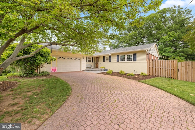 4301 Ivanhoe Pl, Alexandria, VA 22304 - ranch-style house featuring driveway, a garage, and brick siding