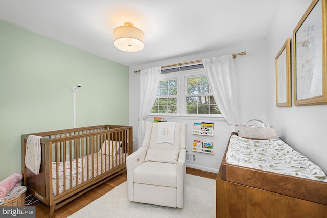 4301 Ivanhoe Pl, Alexandria, VA 22304 - bedroom with wood finished floors and baseboards