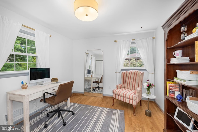 4301 Ivanhoe Pl, Alexandria, VA 22304 - office area featuring wood finished floors and baseboards