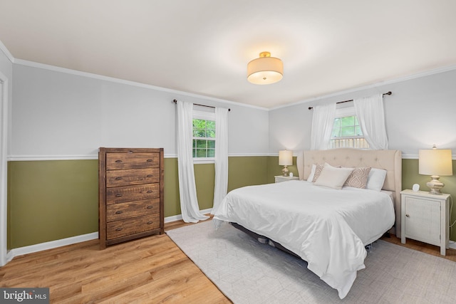 4301 Ivanhoe Pl, Alexandria, VA 22304 - bedroom with light wood-style floors, baseboards, and crown molding