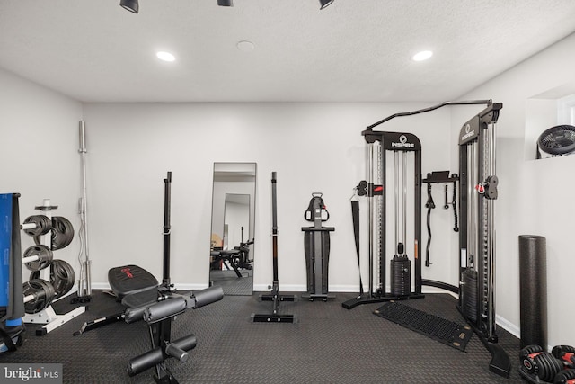 4301 Ivanhoe Pl, Alexandria, VA 22304 - workout room with recessed lighting, baseboards, and a textured ceiling