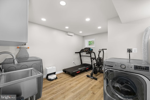 4301 Ivanhoe Pl, Alexandria, VA 22304 - workout room featuring independent washer and dryer, a sink, light wood-style floors, recessed lighting, and baseboards