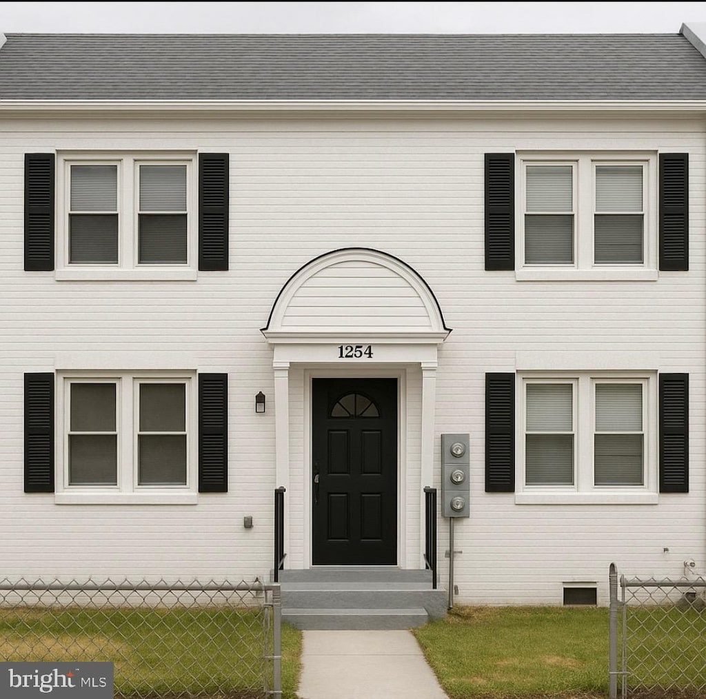 1254 Meigs Pl NE, Washington, DC 20002 - doorway to property with a shingled roof