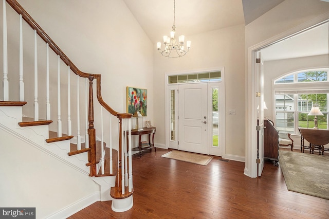 220 Magnolia St, Dresher, PA 19025 - entrance foyer featuring hardwood / wood-style flooring, a chandelier, baseboards, and high vaulted ceiling