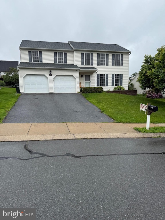 3948 Laurel Run, Columbia, PA 17512 - view of front of property with driveway, a front yard, and a garage