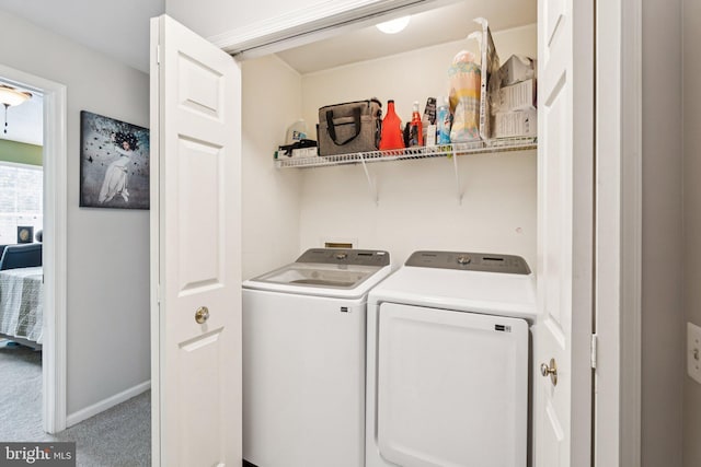 11193 Rienzi Pl Unit 203, Manassas, VA 20109 - laundry room with washing machine and dryer, carpet, and baseboards