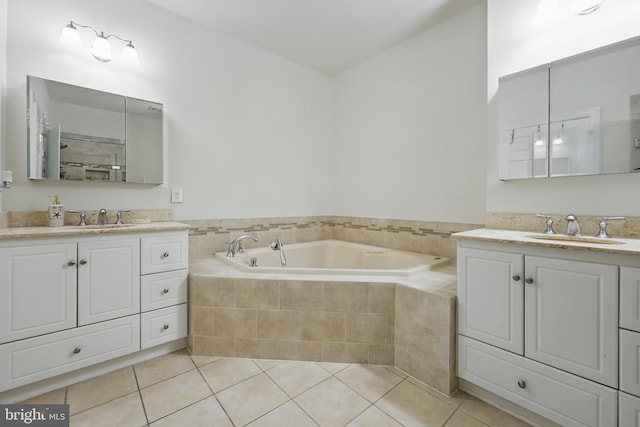 19885 Naples Lakes Ter, Ashburn, VA 20147 - bathroom featuring two vanities, a garden tub, and tile patterned floors