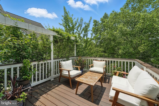 19885 Naples Lakes Ter, Ashburn, VA 20147 - wooden terrace featuring an outdoor living space