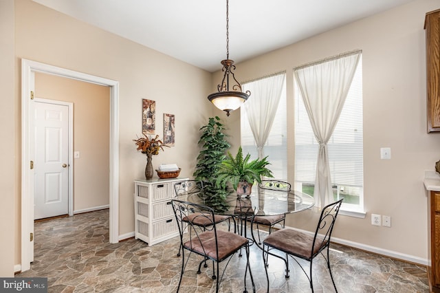 4784 Wermuth Way, Woodbridge, VA 22192 - dining area featuring stone finish flooring and baseboards