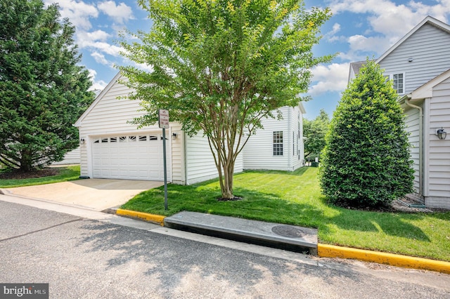 4784 Wermuth Way, Woodbridge, VA 22192 - view of property hidden behind natural elements featuring a front yard, an attached garage, and driveway