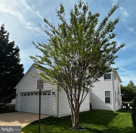 4784 Wermuth Way, Woodbridge, VA 22192 - view of side of property with a yard and a garage