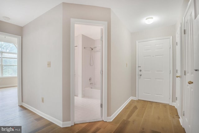4100 Monument Ct Unit 302, Fairfax, VA 22033 - hall featuring light wood-type flooring and baseboards