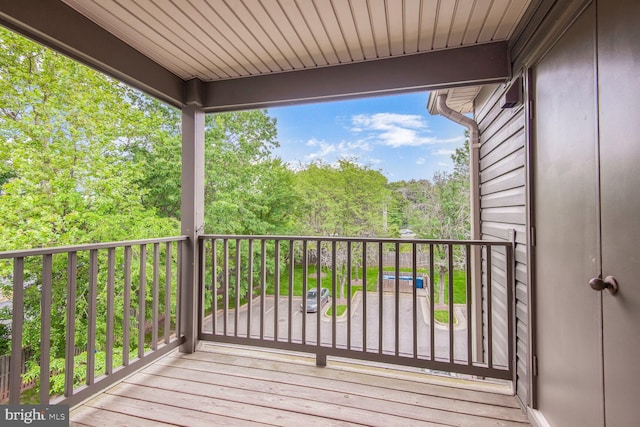 4100 Monument Ct Unit 302, Fairfax, VA 22033 - deck featuring a wooded view
