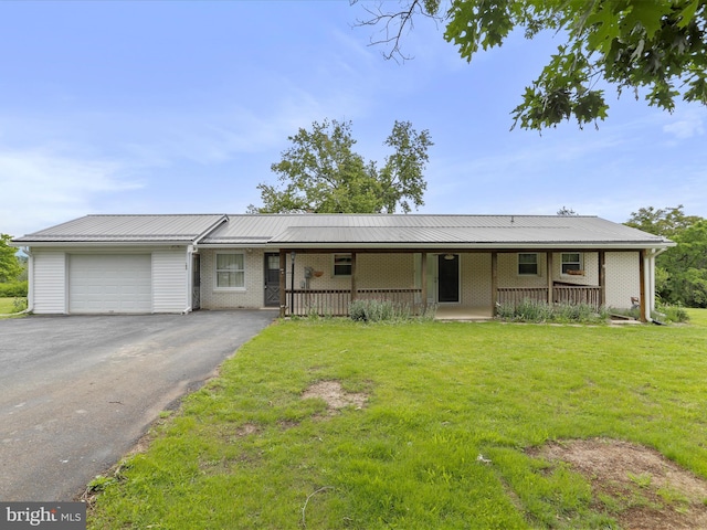 193 Chevy Ln, Berkeley Springs, WV 25411 - ranch-style home with a porch, an attached garage, a front yard, and asphalt driveway