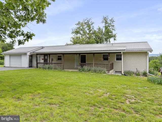 193 Chevy Ln, Berkeley Springs, WV 25411 - ranch-style house featuring an attached garage, brick siding, covered porch, and a front lawn