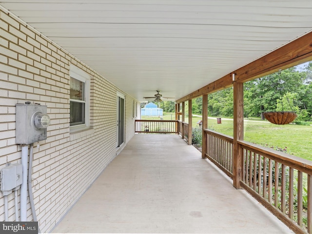 193 Chevy Ln, Berkeley Springs, WV 25411 - covered porch featuring a ceiling fan and a yard