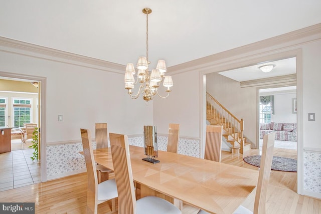 927 Brick Manor Cir, Silver Spring, MD 20905 - dining room with wood finished floors, healthy amount of natural light, stairs, and a chandelier
