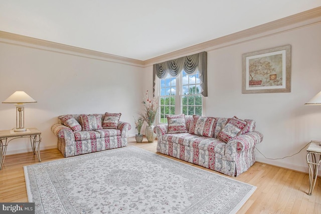 927 Brick Manor Cir, Silver Spring, MD 20905 - living room featuring baseboards, ornamental molding, and wood finished floors
