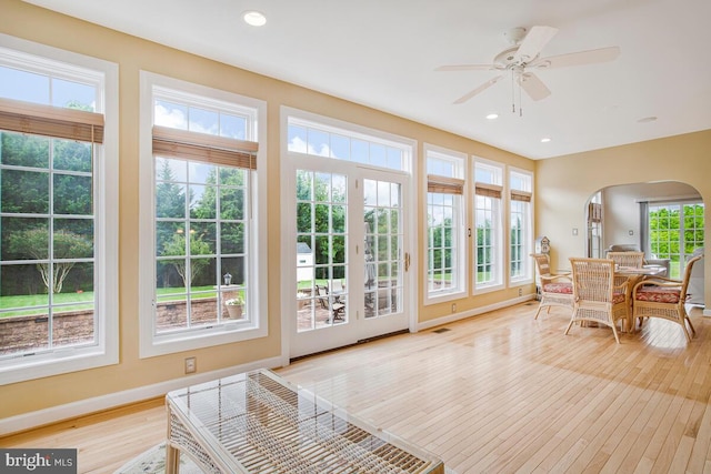 927 Brick Manor Cir, Silver Spring, MD 20905 - sunroom with healthy amount of natural light, arched walkways, and french doors