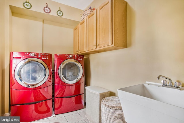 927 Brick Manor Cir, Silver Spring, MD 20905 - laundry room with cabinet space, washer and dryer, and light tile patterned flooring