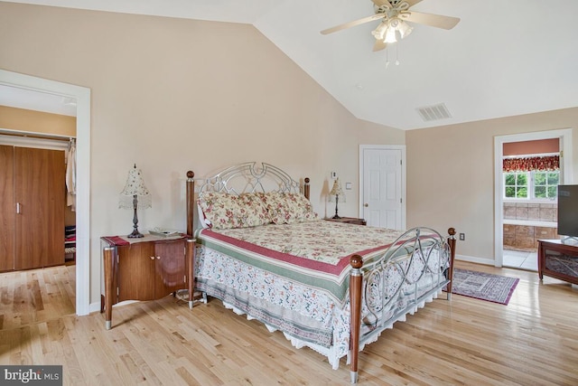 927 Brick Manor Cir, Silver Spring, MD 20905 - bedroom featuring lofted ceiling, wood finished floors, and baseboards