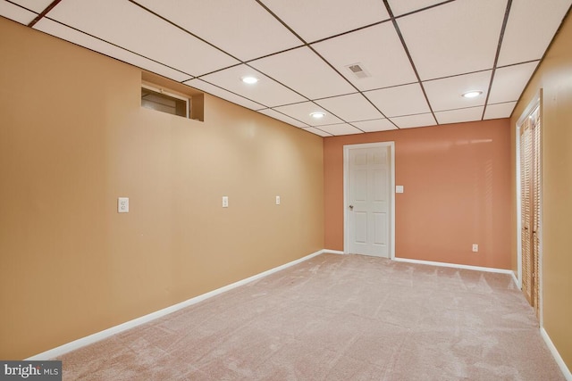 927 Brick Manor Cir, Silver Spring, MD 20905 - basement featuring light colored carpet, baseboards, recessed lighting, and a paneled ceiling